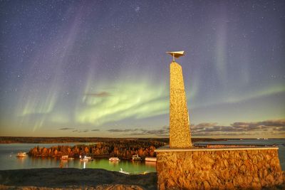 Scenic view of sea against sky at night