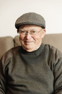 Portrait of mature man wearing hat