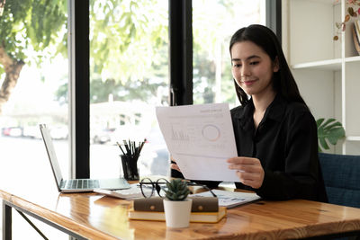 Businesswoman working at office