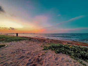 Scenic view of sea against sky during sunset