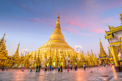 Group of people in temple against building