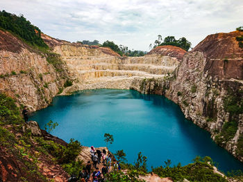 High angle view of lake against cloudy sky