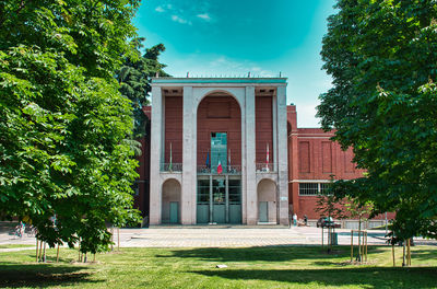 Building exterior with lawn in foreground