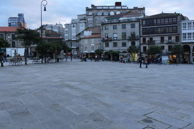 Buildings in city against sky