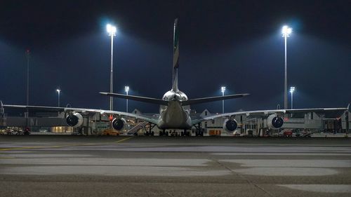 View of airport runway at night