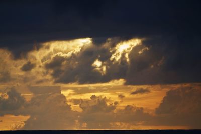 Scenic view of dramatic sky over sea