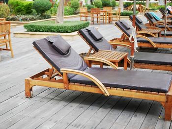 High angle view of empty bench in park