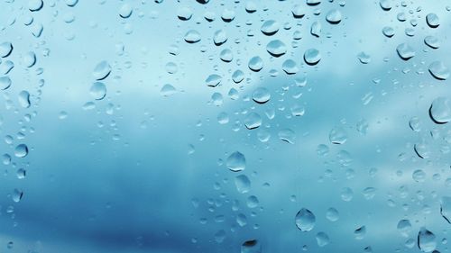 Close-up of water drops on glass