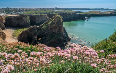 Scenic view of sea and rocks against sky