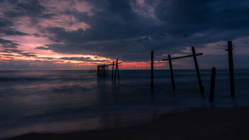 Scenic view of sea against dramatic sky