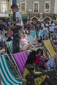High angle view of people sitting outdoors
