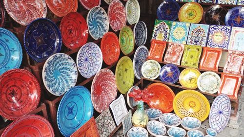 Colorful ceramics plates for sale at street market