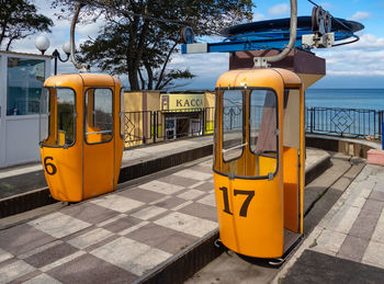 Yellow train on street in city