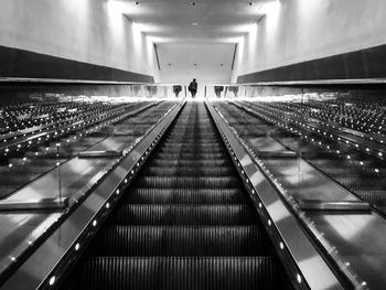 Low angle view of illuminated escalator