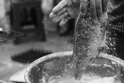 Close-up of hand holding fountain