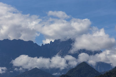 Low angle view of mountain range against sky