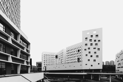 Low angle view of buildings against clear sky