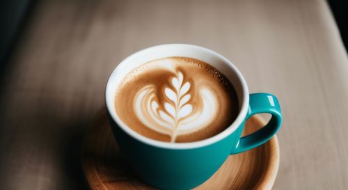 Close-up of cappuccino on table