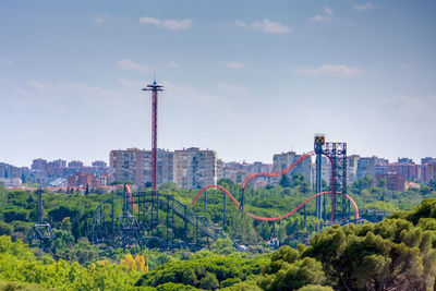 View of buildings in city against sky