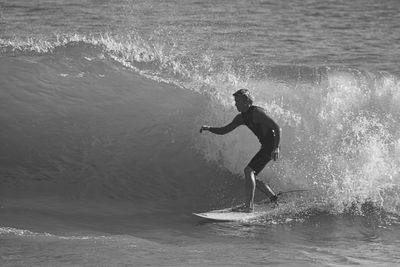 Man surfing in sea