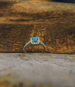 Close-up of wedding rings on table