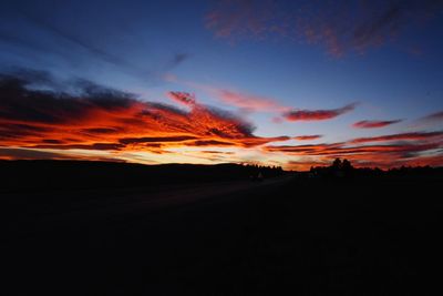 Scenic view of dramatic sky during sunset