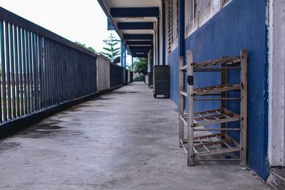 Empty alley amidst buildings in city