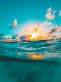 Close-up of water in sea during sunset