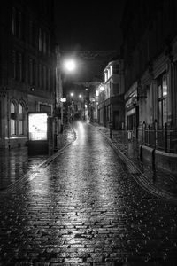 Illuminated buildings in city at night