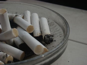 High angle view of cigarette in container