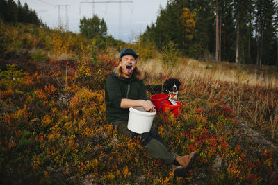 Portrait of senior woman on field during autumn