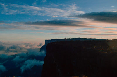 Scenic view of dramatic sky during sunset