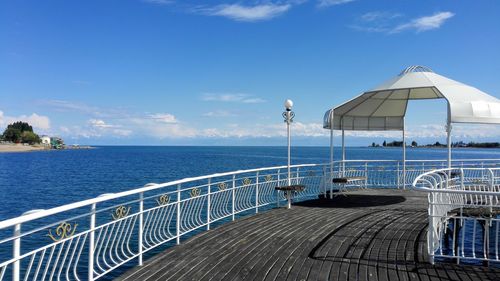 Scenic view of sea against blue sky
