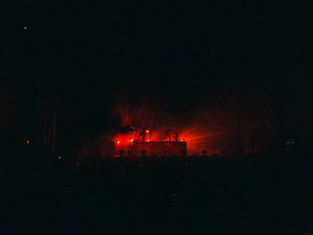 Silhouette of fire at night