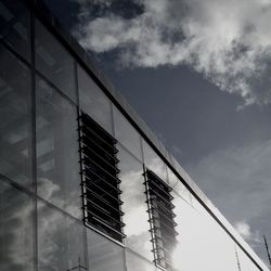 Low angle view of modern building against sky