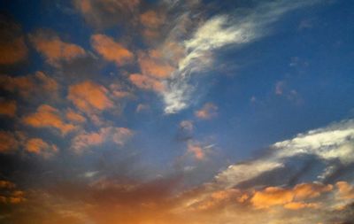 Low angle view of cloudy sky during sunset