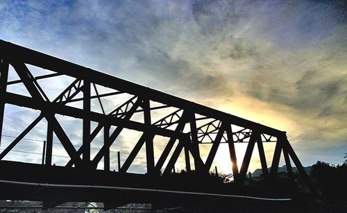Low angle view of cloudy sky at sunset