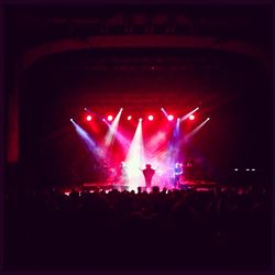 People enjoying music concert