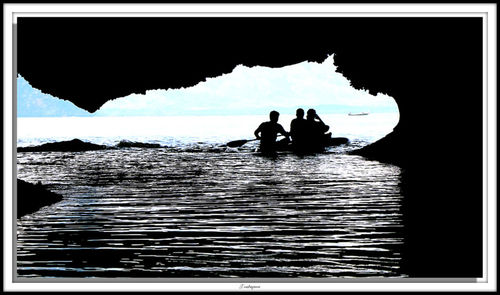 Silhouette man in water