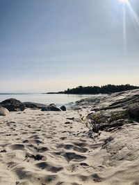 Scenic view of beach against sky