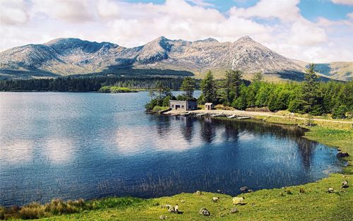 Landscape scenery with lake house and mountains in the background at lough inagh  galway, ireland
