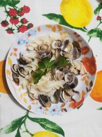 High angle view of fruits in plate on table
