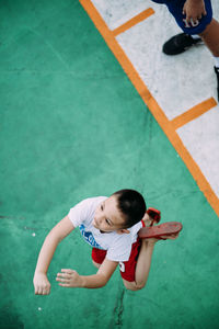 High angle view of girl and woman in water