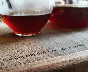 Close-up of beer glass on table