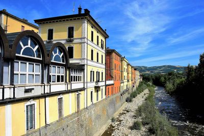 Buildings against blue sky