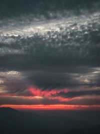 Scenic view of dramatic sky during sunset