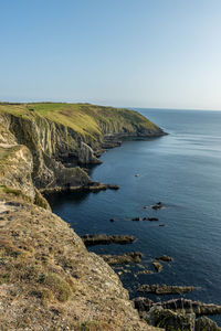 Scenic view of sea against clear sky