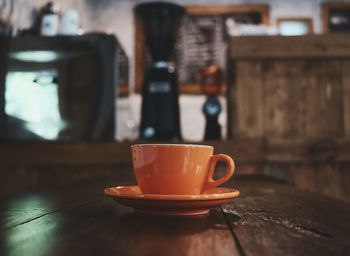 Close-up of coffee cup on table