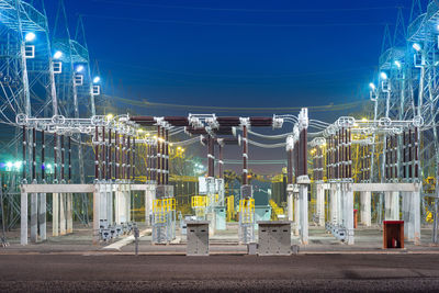 View of an electric substation at night