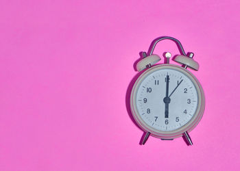 Close-up of clock on wall